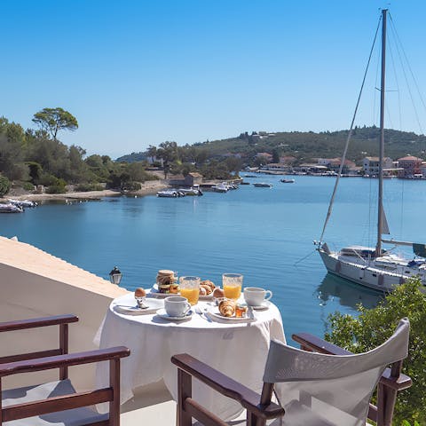 Watch the boats bob on the water as you tuck into breakfast