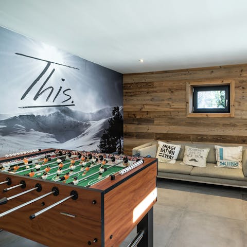 Challenge your guests to a round of table football in the games room