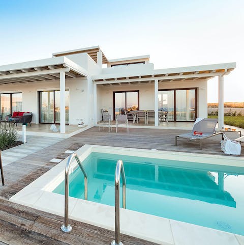 Go for a dip in the private pool under summer skies