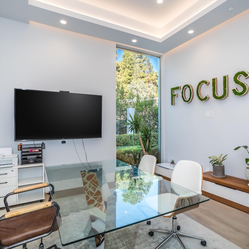 Stay professional during remote work with the sleek and modern office space