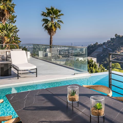 Go for a swim to escape the LA heat, or dine alfresco with stunning panoramic views of the hills