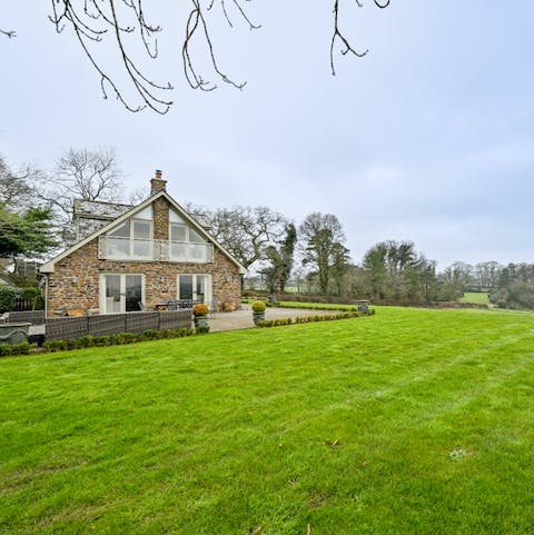 Make the most of the warmer months by dining outdoors and relaxing in the ample garden