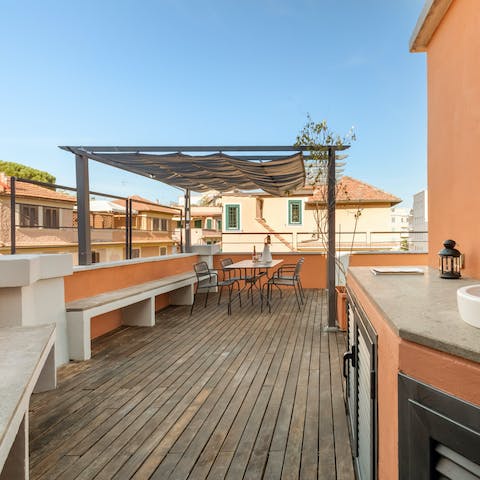 Spend balmy summer evenings on the rooftop terrace
