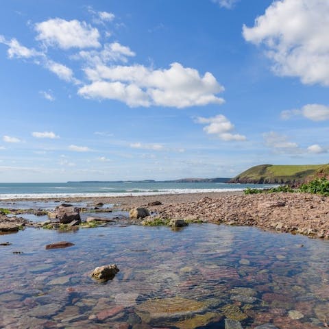 Spend sunny afternoons relaxing on Lydstep Beach, a twenty-two-minute walk or five-minute drive away