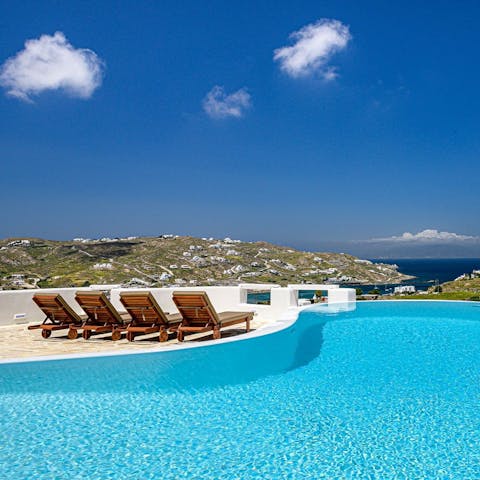 Enjoy a refreshing dip in the pool or relax poolside in the sun
