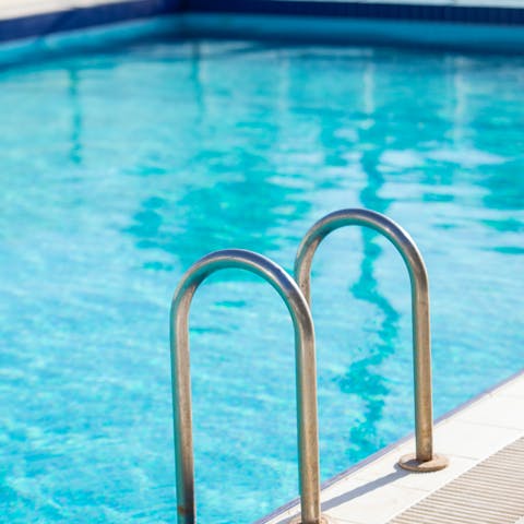 Take a dip in the refreshing pool as the sun shines down on you