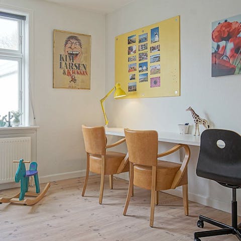 Let the kids roam in the playroom, or use it as a workspace after hours