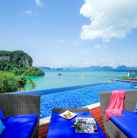 Gaze out at the limestone cliffs and the Andaman Sea from your private infinity pool