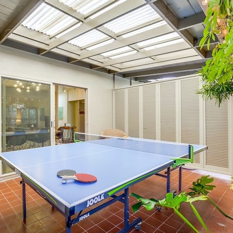 Challenge friends or family to a game of ping-pong in the light-filled games room