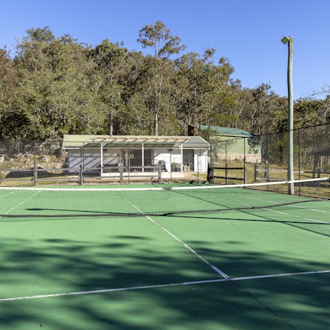 Work up a sweat playing tennis on your private court