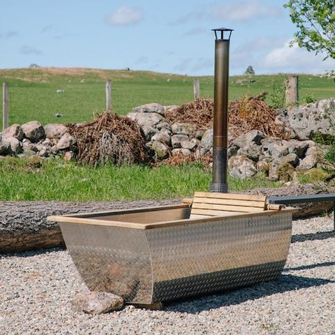 Go for a soak in the wood-fired Swedish hot tub after a long walk around the grounds