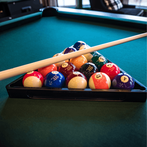 Have a laugh with the whole family over a game of pool 