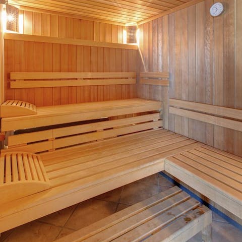 Settle into the gentle warmth of the sauna