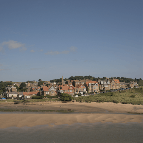 Hop in the car and take a thirty-minute drive to the quaint town of Alnmouth