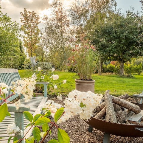 See the Sussex sky light up with stars as you sit by the fire pit in the private garden