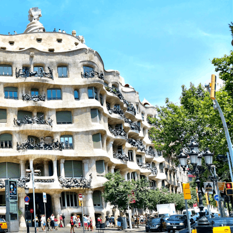 Admire the architecture on Passeig de Gràcia – a fourteen–minute walk away 