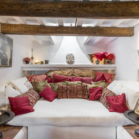 Sneak away with a good book to the lavish snug area feathered by boho cushions