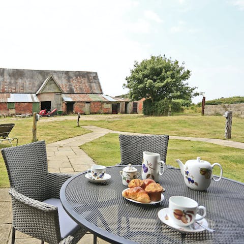 Enjoy some afternoon tea at the outdoor dining area 