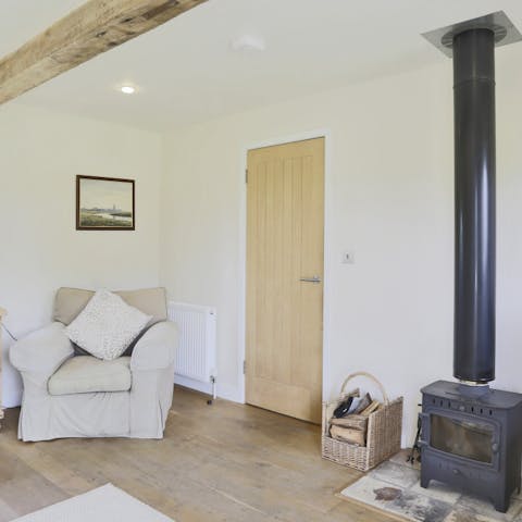 Spend cool evenings by the warmth of the wood burning stove