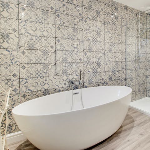 Soak in the beautiful freestanding oval tub