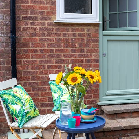 Sit outside with your morning cup of tea and watch the world pass by
