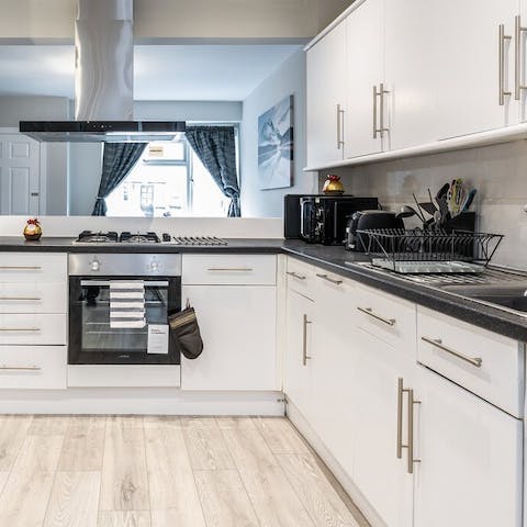 Rustle up home-cooked meals in the sociable open-plan kitchen