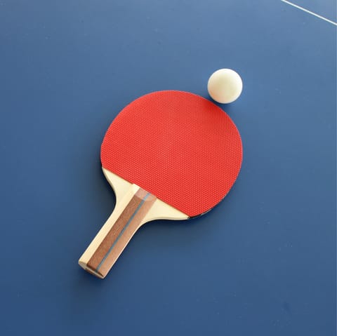 Challenge your loved ones to a game of table tennis in the games room