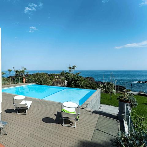 Cool off in the swimming pool and enjoy the sea views