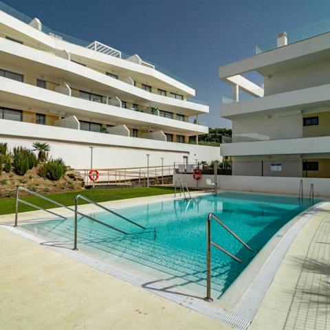 Cool off from the Spanish sunshine in the communal pools