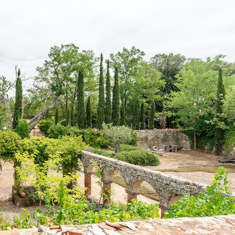 Wander through the magical gardens, bursting with fragrant flowers