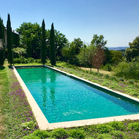 Swim lengths in the crystalline 18 metre salt water infinity pool