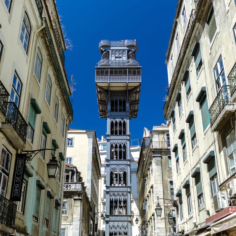Take a ride on the Santa Justa Lift, a fourteen-minute stroll from your door
