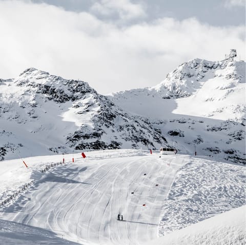 Wind your way down the pistes of Les Grands Montets - only a three-minute walk to the nearest ski lift