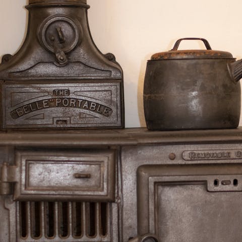 Get cosy by the antique kitchen stove