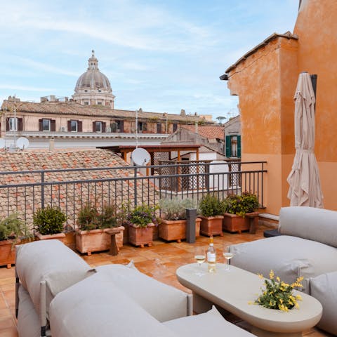 Hang out on the communal roof terrace, a perfect spot to watch the sunset