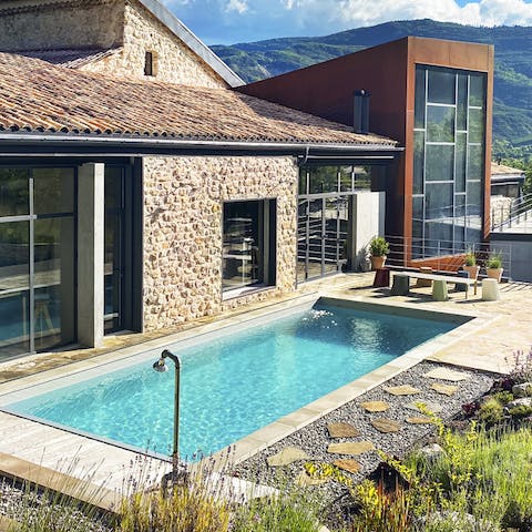 Dive into the heated swimming pool then cool off under the outdoor shower