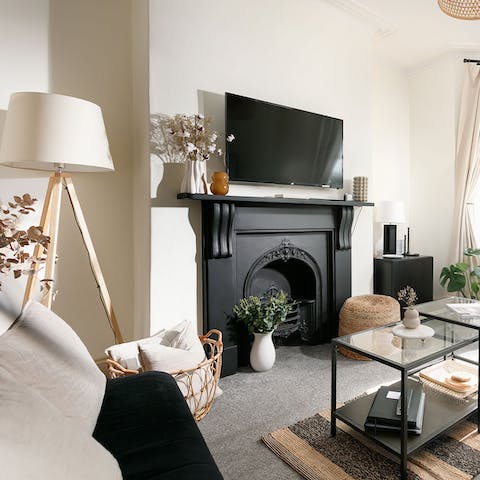 Gather for cosy evenings of movies in the charming living room 