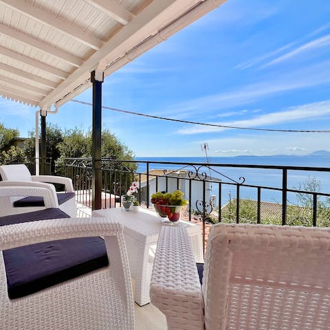 Relax on your private patio and admire the stunning sea views 