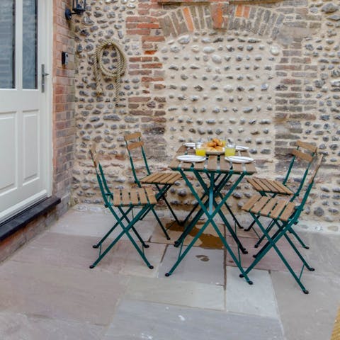 Savour breakfast from the local deli in the suntrap courtyard