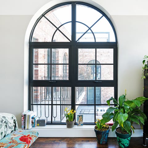 Enjoy lots of natural light through the enormous arched windows