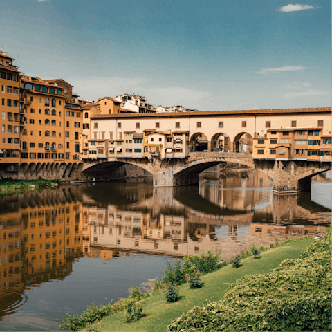 Wander along the river Arno for a few minutes to reach the Ponte Vecchio