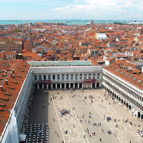 Stroll to nearby Piazza San Marco for a morning cappuccino