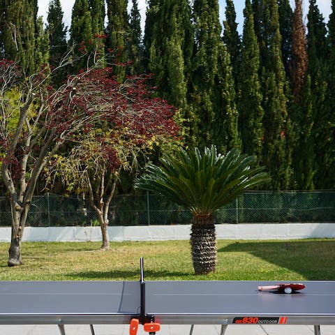 Partake in a game of table tennis on a lazy afternoon and see who's the most competitive