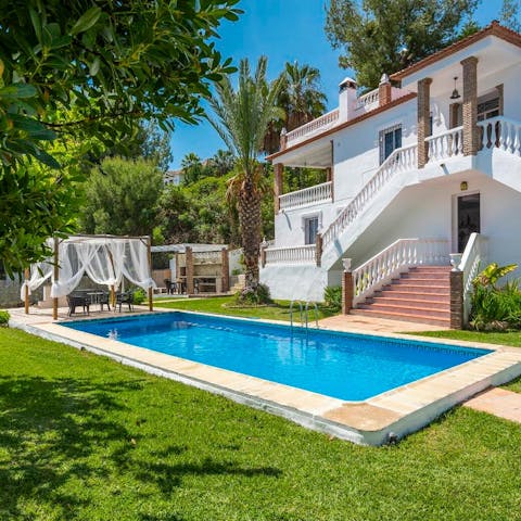 Splash around in the private pool before dining on a tapas spread next to it