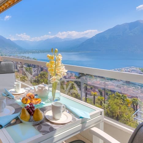 Take in the breathtaking view of the Swiss Alps while enjoying your morning coffee