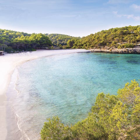 Spend the day on the shores of Cala Santanyi, only a short drive away