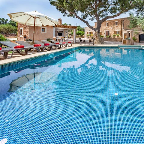 Dive into the private pool after a morning of sunbathing 