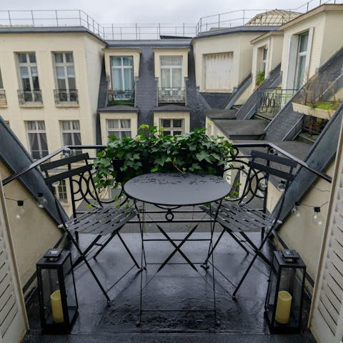 Relax on the private balcony with a glass of Champagne