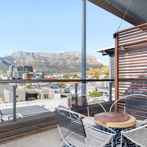 Admire the stunning Table Mountain views from the large, private balcony