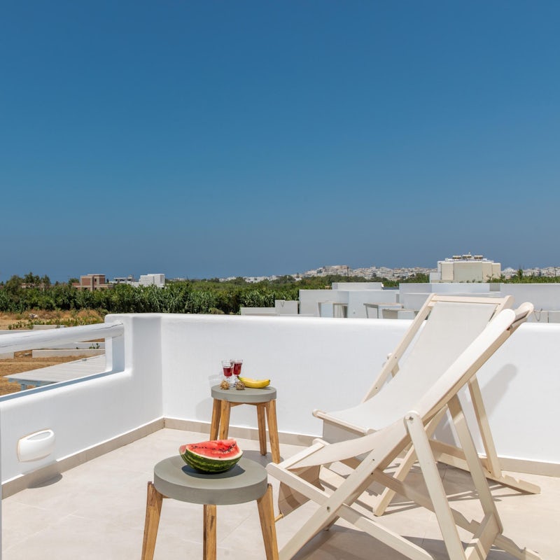 Soak up the Greek sun from the rooftop balcony